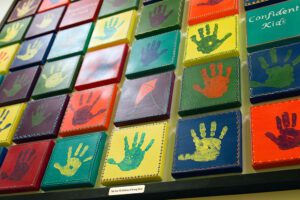 Hand print artwork by children at Strong Start Early Learning Center