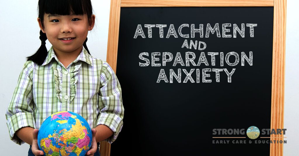 a child standing in front of a whiteboard