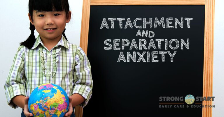 a child standing in front of a whiteboard