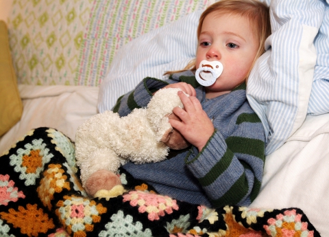 a child with a stuffed animal