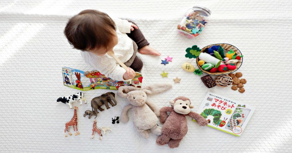 a child with various toys