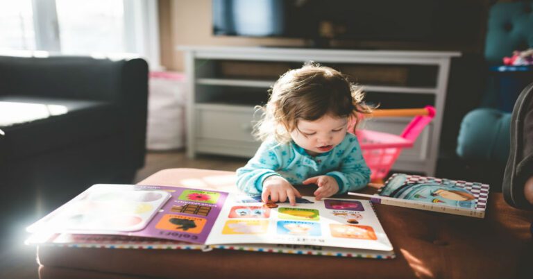 a child looking at a book