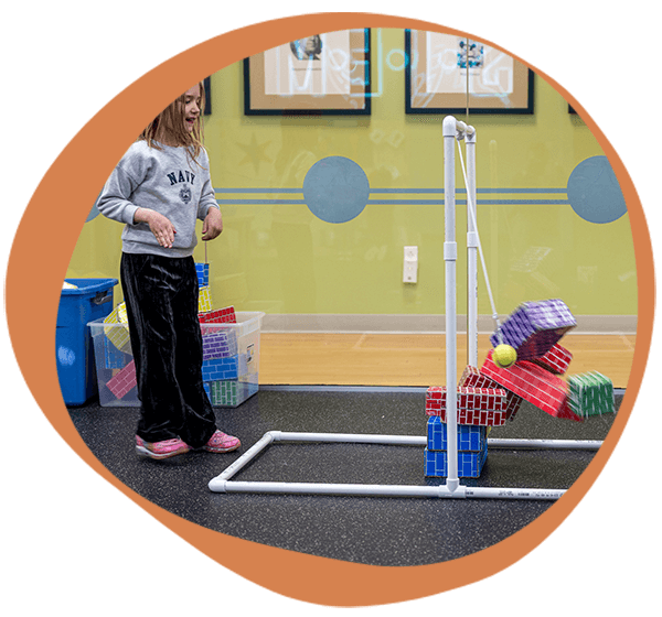 a student playing at one of our educational centers