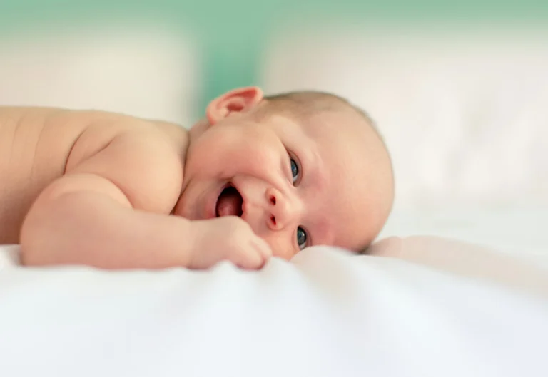 An infant smiling