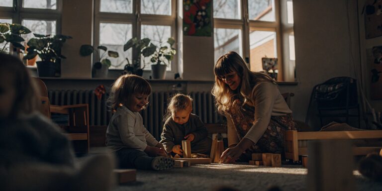 Children enjoying the benefits of learning and play in a full day preschool classroom.
