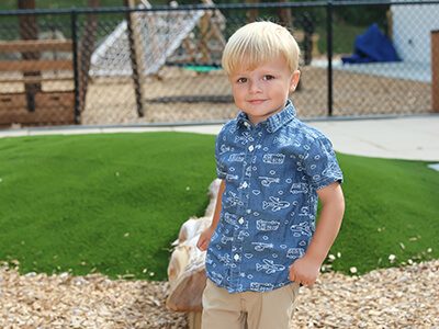 A child standing outside